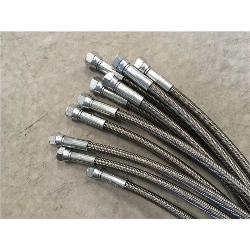 Flexible PTFE lisse 1TI DN5/16 PS 180bar LHT1800mm EQ. 2/ Femelle JIC 9/16 acier